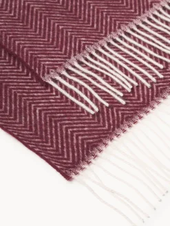 Coperta in lana con motivo a spina di pesce e frange Tyrol