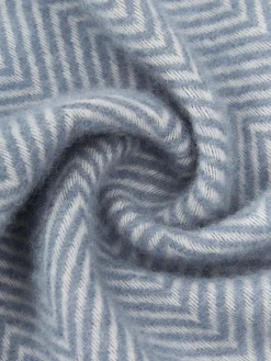Coperta in lana con motivo a spina di pesce e frange Tyrol
