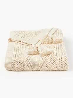 Coperta lavorata a maglia con nappe Sarah