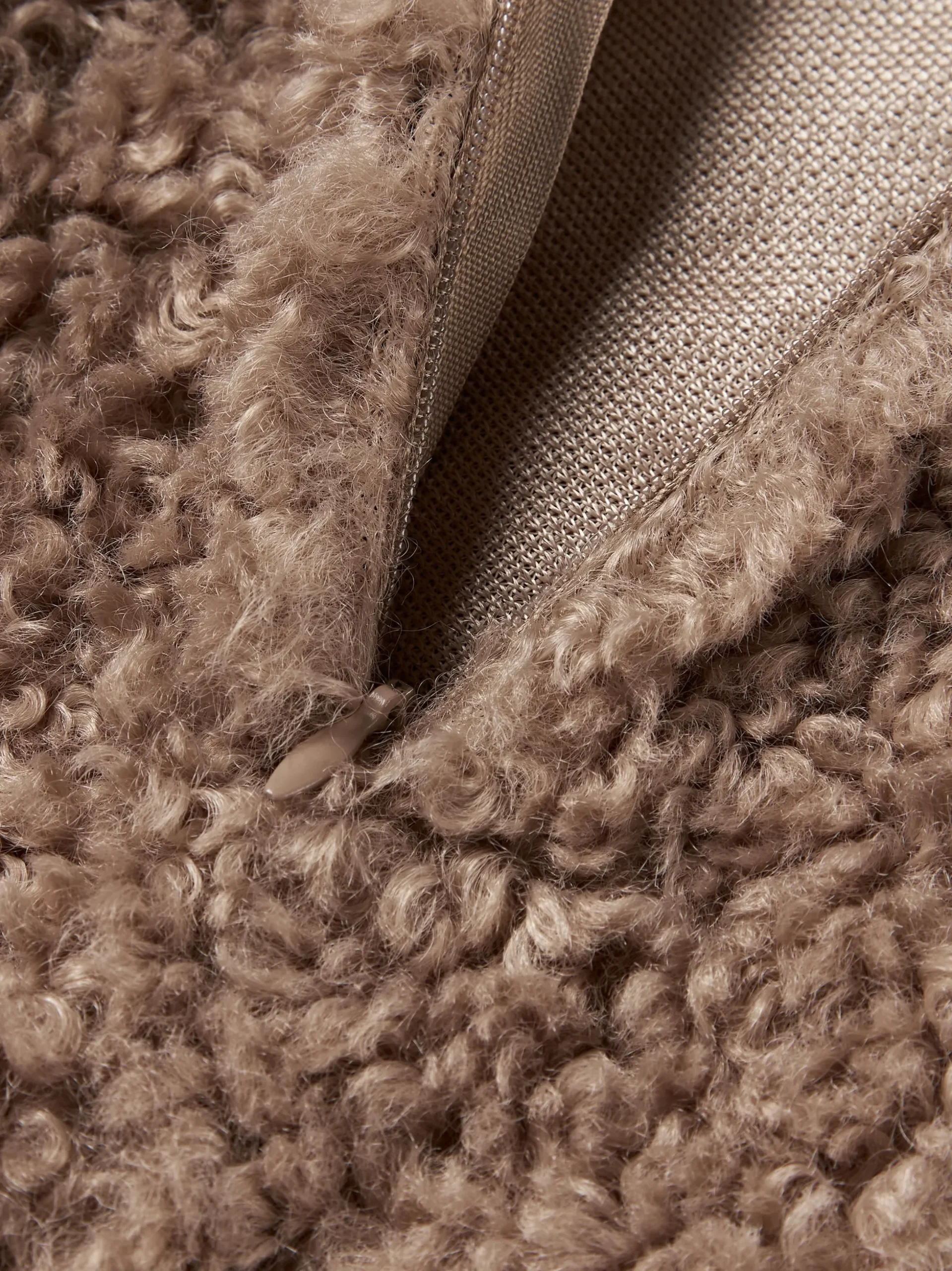 Copricuscino in teddy Dotty