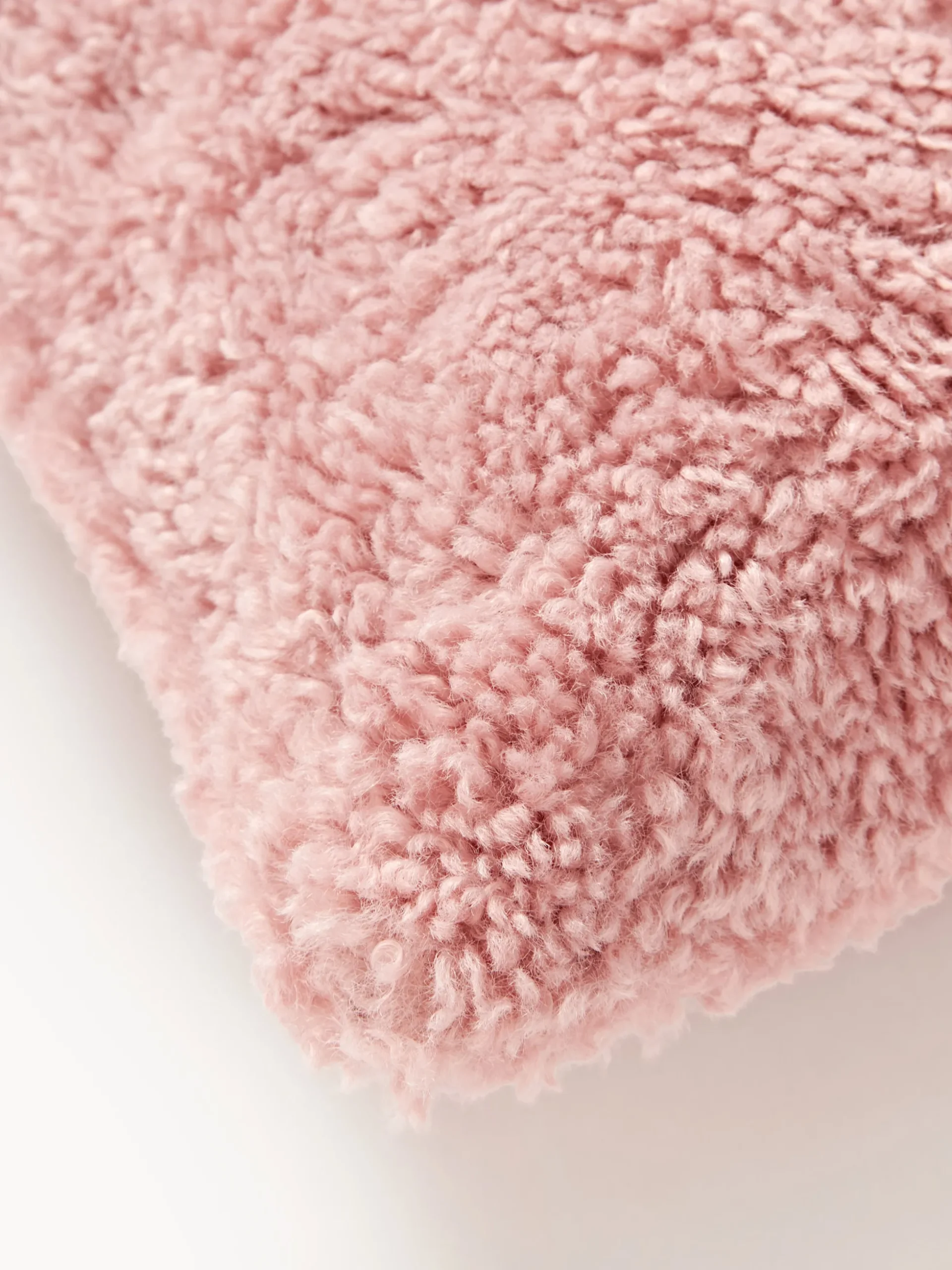 Copricuscino in teddy Dotty