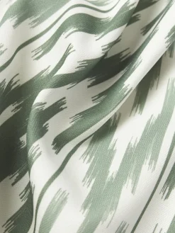 Copricuscino da esterno con motivo ikat Maillot
