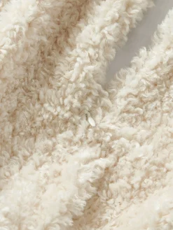 Copricuscino in teddy Dotty