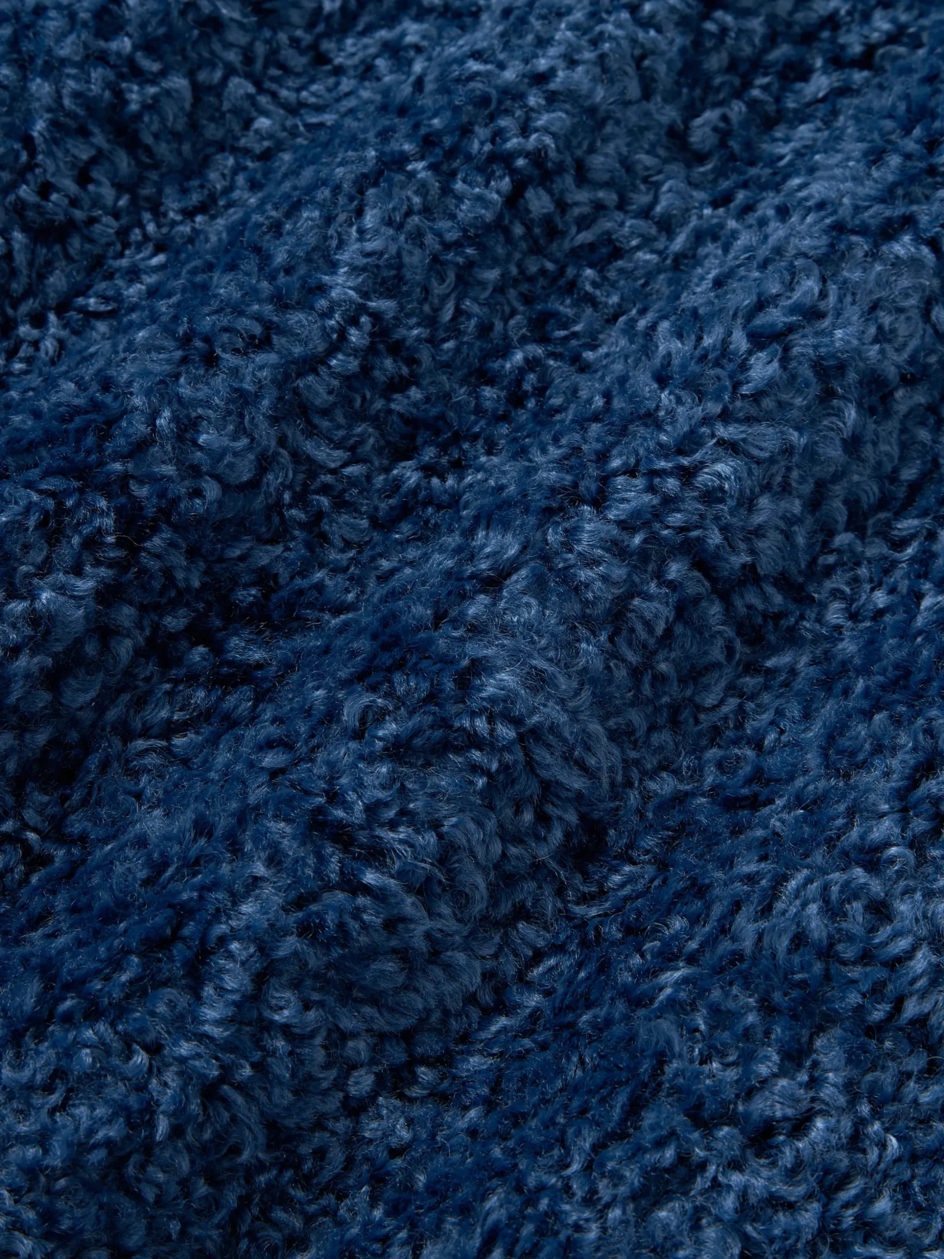 Copricuscino in teddy Dotty