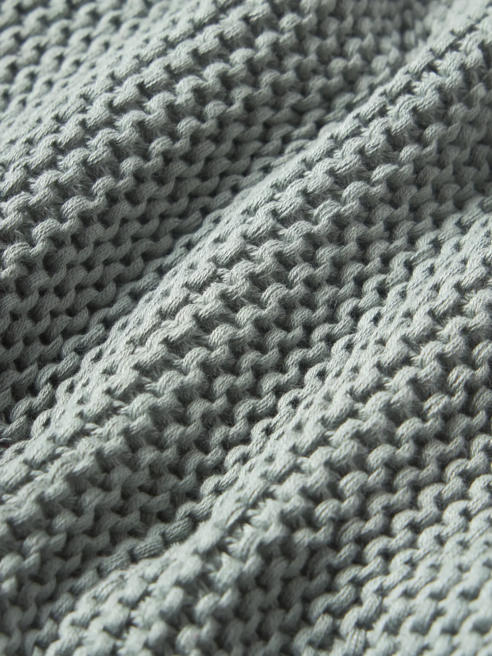 Copricuscino lavorato a maglia in cotone organico Adalyn