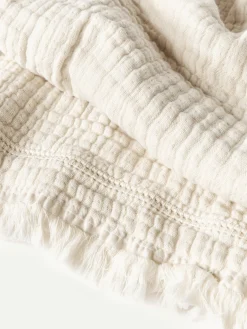 Copriletto in cotone con frange Kailani