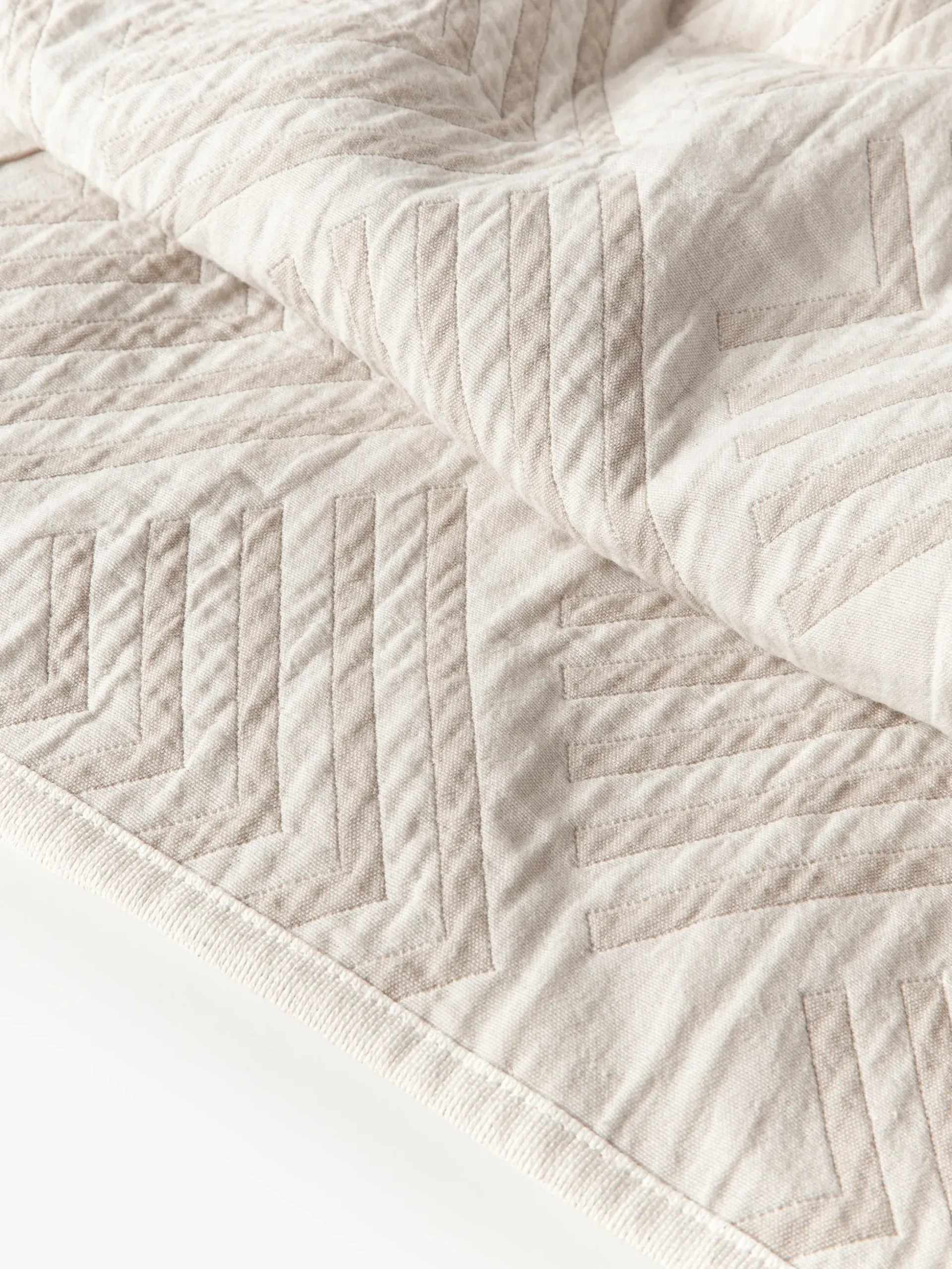 Copriletto jacquard con motivo grafico Milano