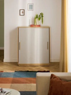 Credenza alta in legno con frontale imbottito Wisp