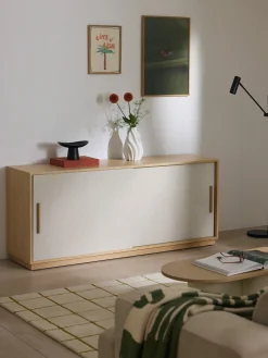 Credenza in legno con frontale imbottito Wisp