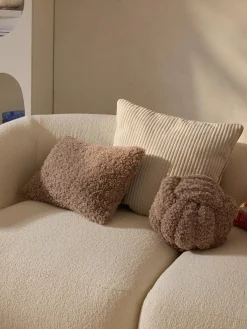 Cuscino annodato in teddy Dotty