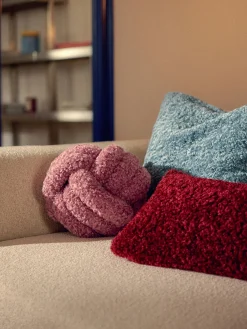 Cuscino annodato in teddy Dotty