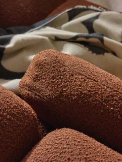 Cuscino per divano in bouclé Tayla