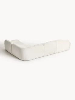Divano angolare componibile 4 posti con chaise longue in teddy bouclé Wolke