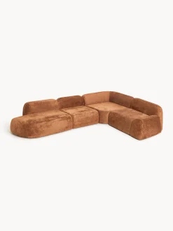 Divano angolare componibile 4 posti con chaise longue in teddy bouclé Wolke