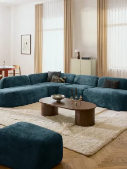 Divano angolare componibile 4 posti con chaise longue in teddy bouclé Wolke