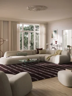 Divano angolare componibile XL in bouclé con chaise longue Wolke