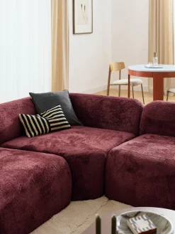 Divano angolare componibile 4 posti con chaise longue in teddy bouclé Wolke