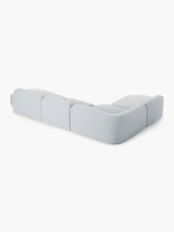 Divano angolare componibile XL in bouclé con penisola Wolke