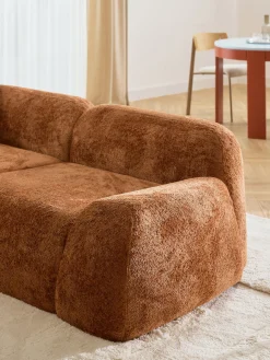 Divano angolare componibile 4 posti con chaise longue in teddy bouclé Wolke