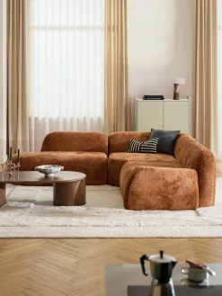 Divano angolare componibile 4 posti con chaise longue in teddy bouclé Wolke