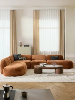 Divano angolare componibile 4 posti con chaise longue in teddy bouclé Wolke