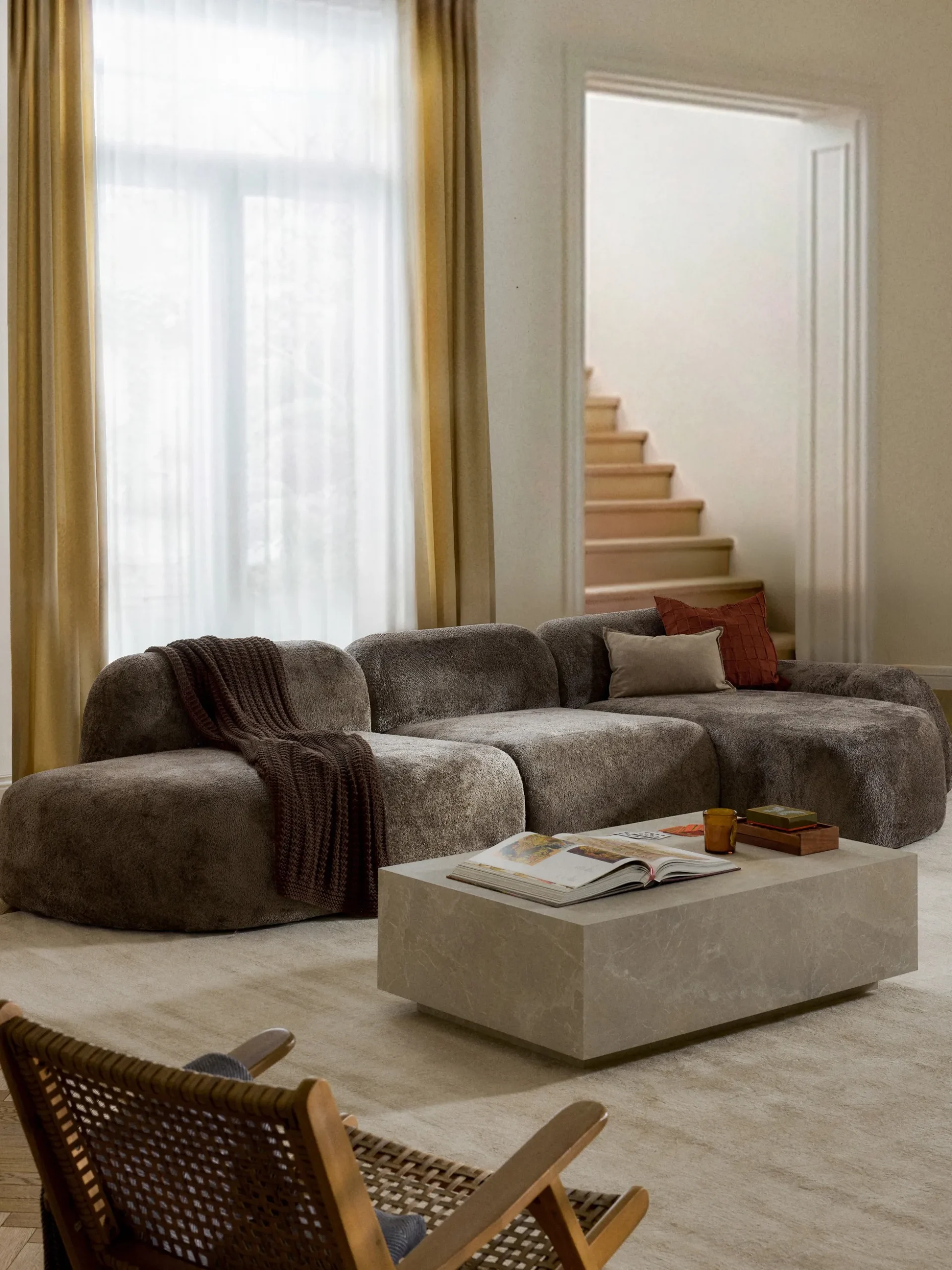 Divano angolare componibile 4 posti in teddy bouclé con chaise longue Wolke