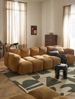 Divano componibile 4 posti in teddy-bouclé Tayla