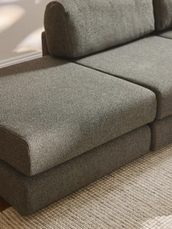 Divano letto angolare in bouclé con contenitore Ladina