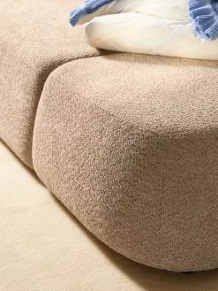 Divano letto angolare in teddy-bouclé con contenitore Pao