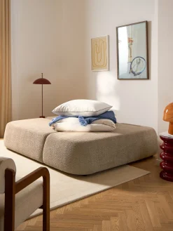Divano letto angolare in teddy-bouclé con contenitore Pao