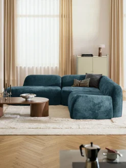 Divano angolare componibile 4 posti con chaise longue in teddy bouclé Wolke
