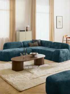 Divano angolare componibile 4 posti con chaise longue in teddy bouclé Wolke