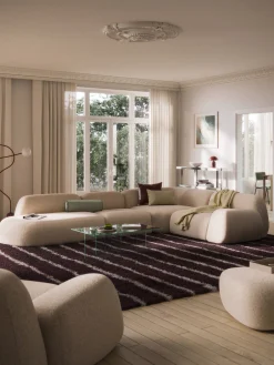 Divano angolare componibile XL in bouclé con chaise longue Wolke
