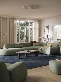 Divano angolare componibile XL in bouclé con chaise longue Wolke