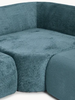 Divano angolare componibile 4 posti con chaise longue in teddy bouclé Wolke