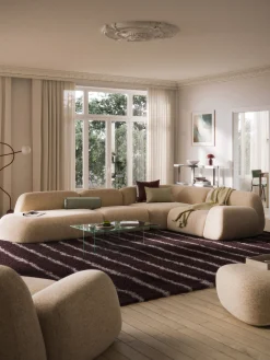 Divano angolare componibile XL in bouclé con chaise longue Wolke