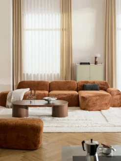 Divano angolare componibile 4 posti con chaise longue in teddy bouclé Wolke