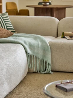 Divano angolare componibile 4 posti con chaise longue in teddy bouclé Wolke
