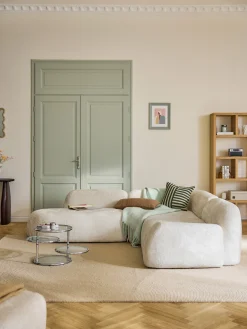Divano angolare componibile 4 posti con chaise longue in teddy bouclé Wolke