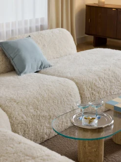 Divano angolare XL componibile 4 posti con chaise longue in teddy Wolke