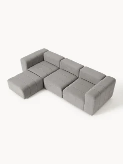 Divano componibile 4 posti in bouclé con poggiapiedi (sinistra/destra) Lena