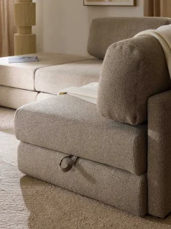 Divano letto angolare in bouclé con contenitore Ladina