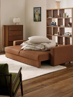 Divano letto 3 posti in bouclé con vano contenitore Tasha