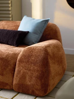 Divano 2 posti con chaise longue in teddy bouclé Wolke