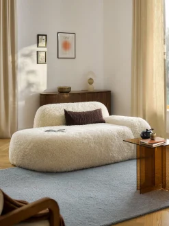 Divano 2 posti con chaise longue in teddy Wolke