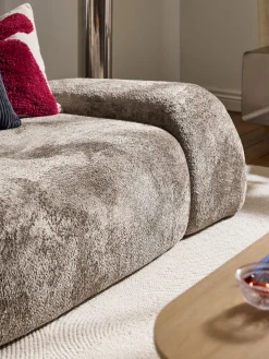 Divano 2 posti in teddy bouclé con chaise longue Wolke
