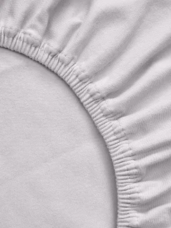 Lenzuolo con angoli topper in jersey-elastan Lara