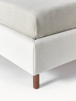 Letto imbottito con piedini in legno Giulia