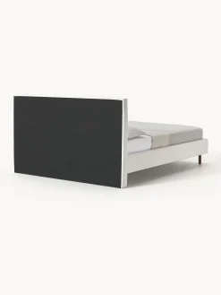 Letto imbottito con piedini in legno Giulia