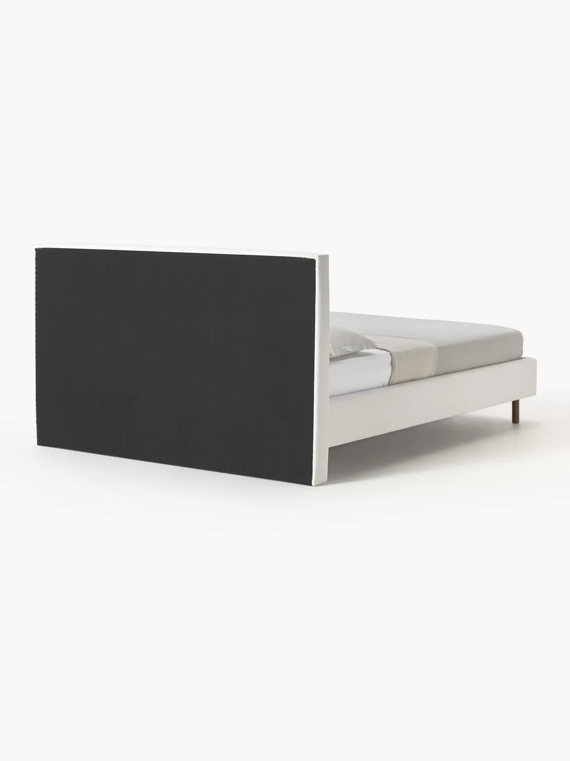 Letto imbottito con piedini in legno Giulia